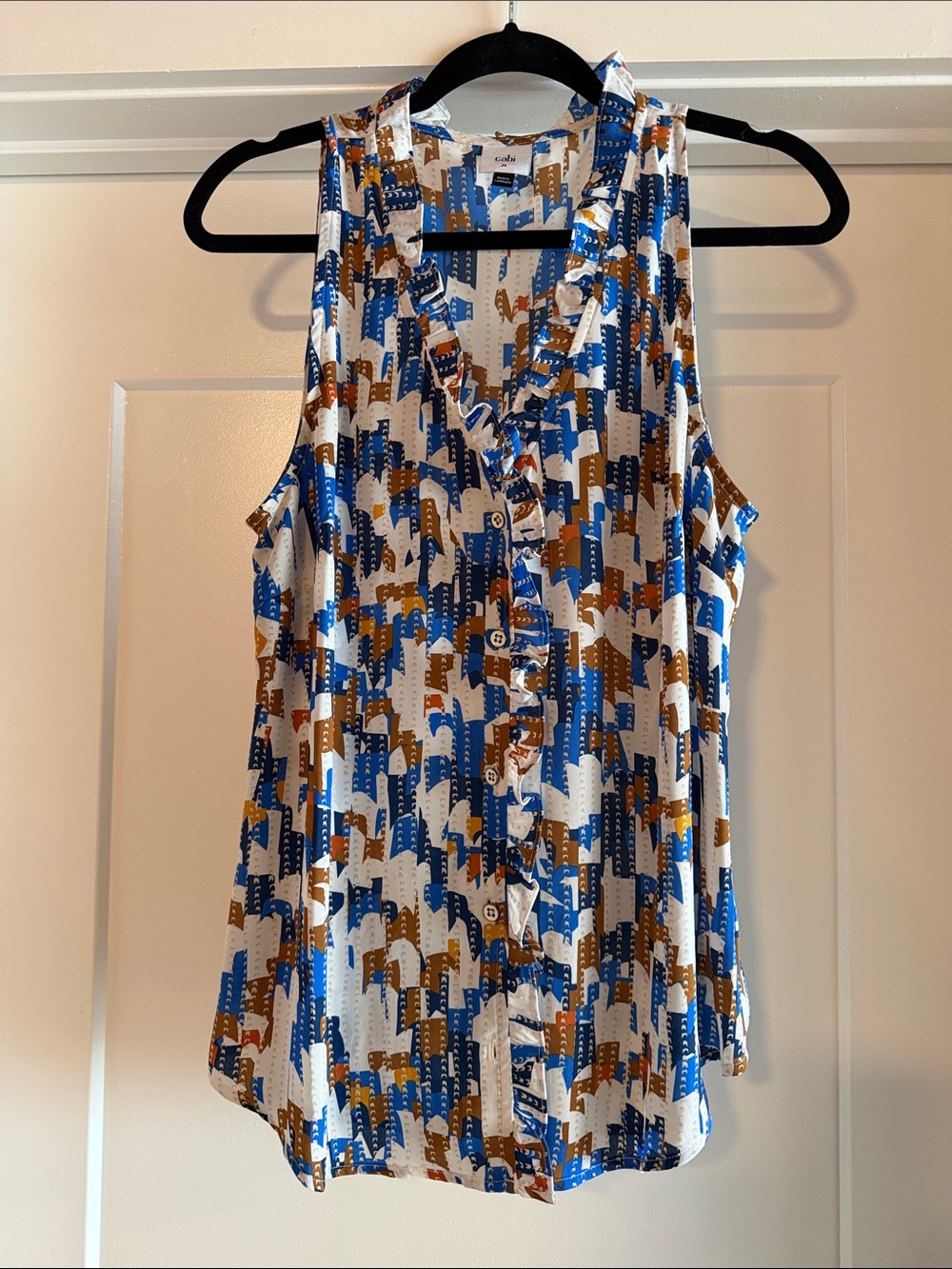 CAbi Sleeveless Ruffle-Trim Button Front Top in Blue and Brown